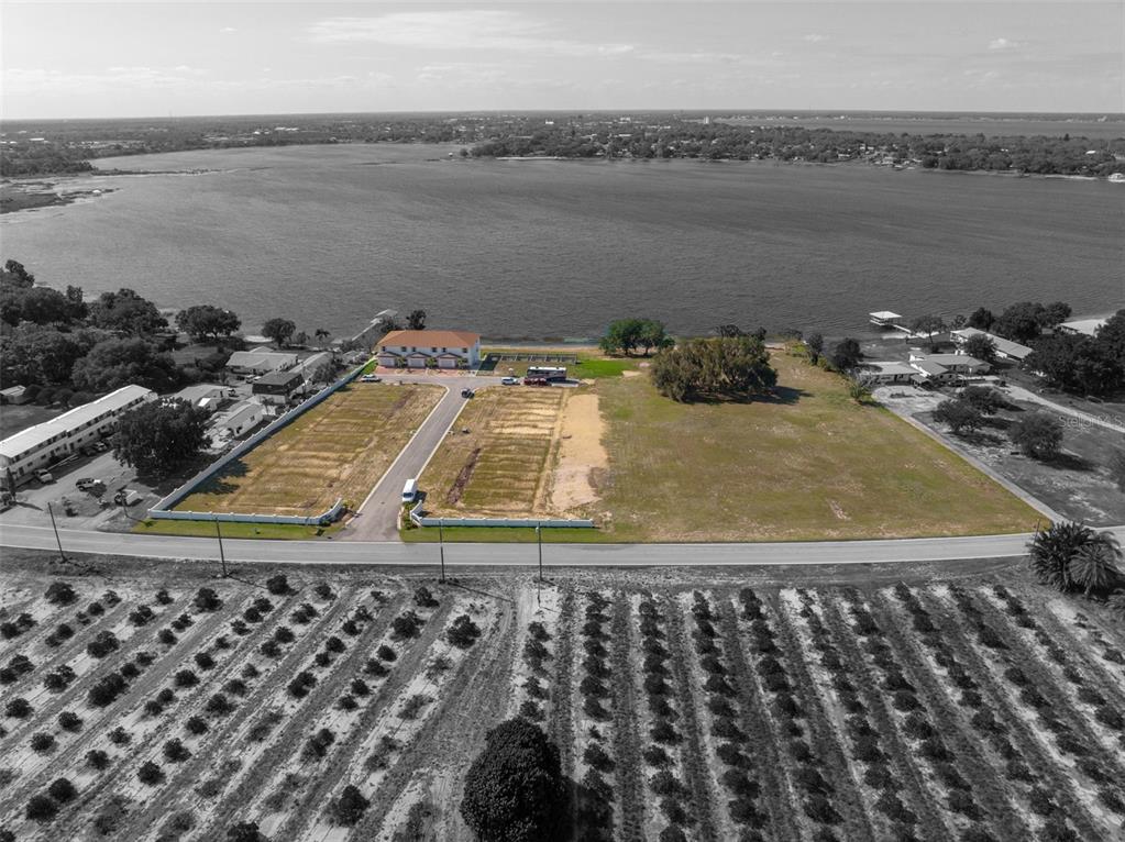 1877 Arbuckle Creek Road Sebring, FL 33870 - Photo 2 of 50 a view of a lake with houses