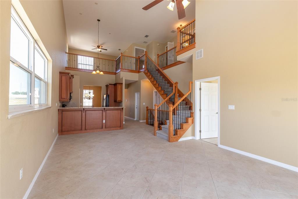 1877 Arbuckle Creek Road Sebring, FL 33870 - Photo 44 of 50 a view of a livingroom with furniture and stairs