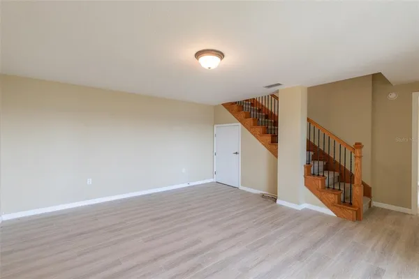 a view of a hallway with a window