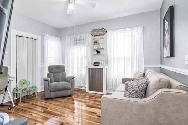 11 Cambridge Street Lawrence, MA 01843 - Photo 8 of 40 a living room with furniture and a window