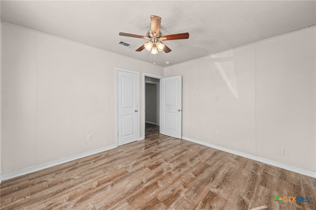 906 South 2nd Street Temple, TX 76504 - Photo 24 of 41 wooden floor in an empty room
