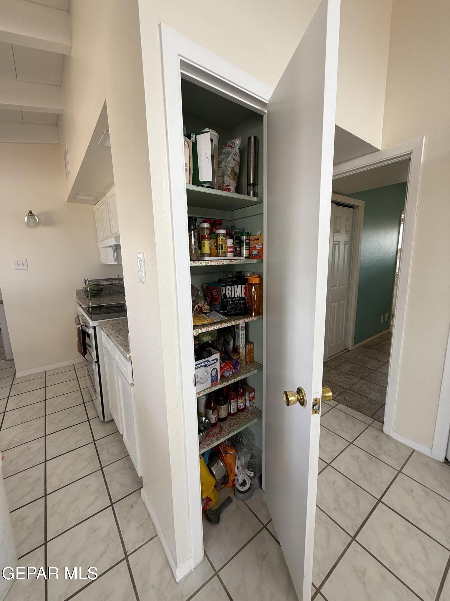 313 Clairemont Road El Paso, TX 79912 - Photo 28 of 34 a room with walk in closet and a window