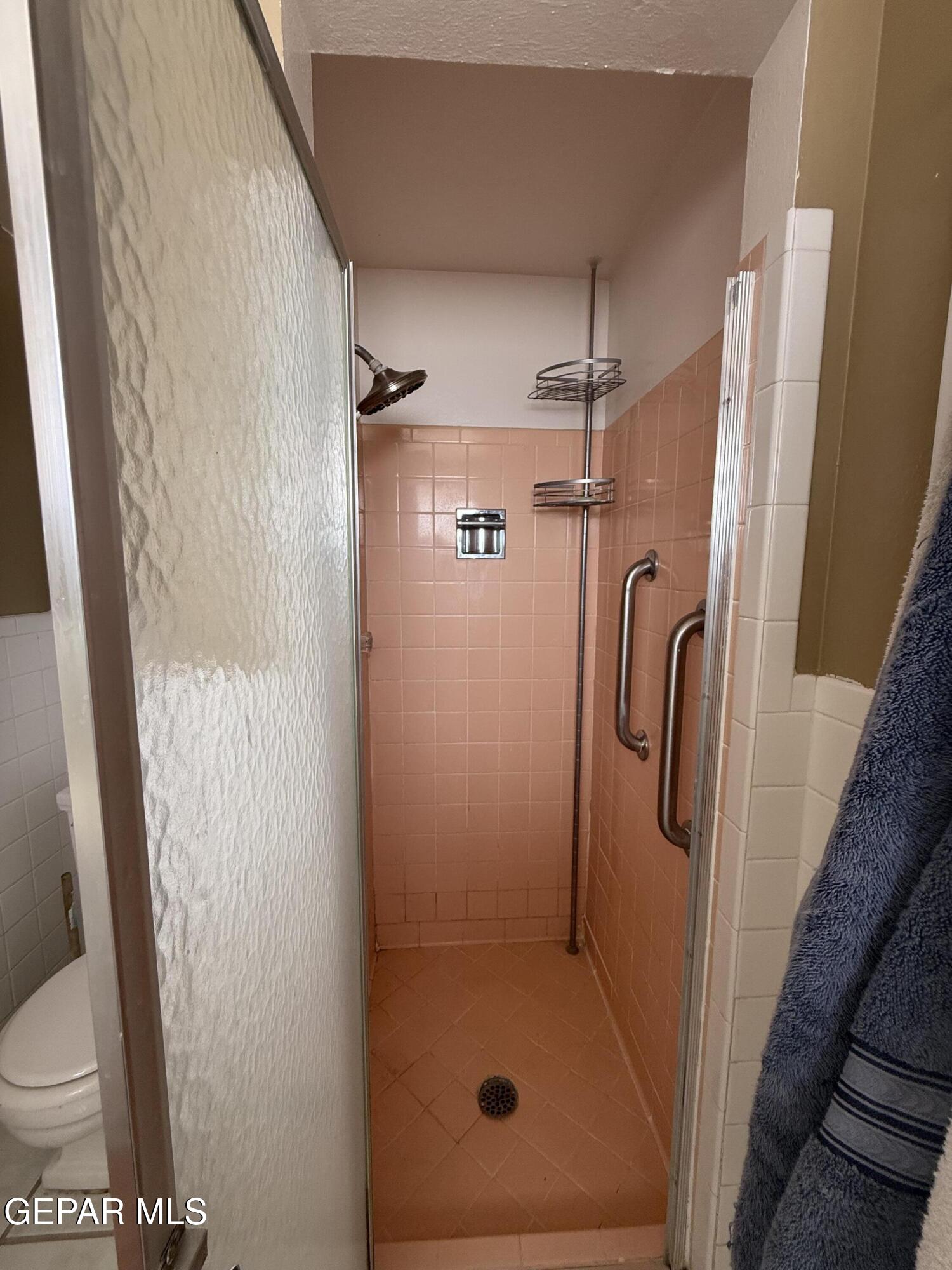 313 Clairemont Road El Paso, TX 79912 - Photo 34 of 34 a bathroom with a shower
