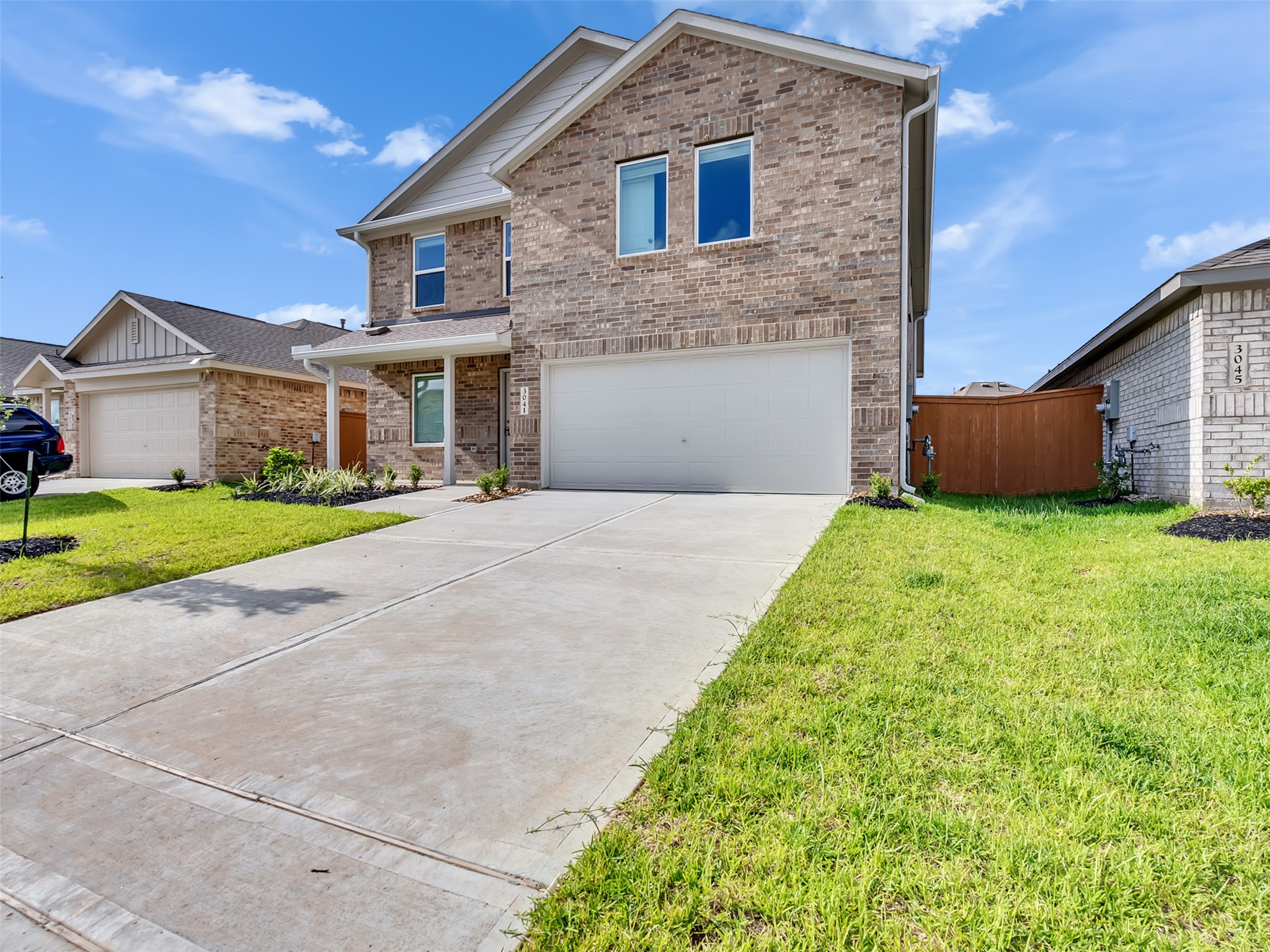 3041 Colusa Rdg Drive Katy, TX 77493 - Photo 2 of 26 a front view of house with yard and green space