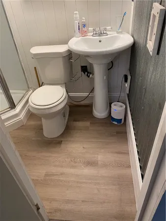 a bathroom with a sink and a toilet