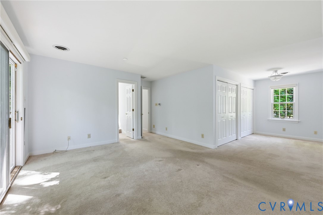 3201 East Brigstock Road Midlothian, VA 23113 - Photo 47 of 72 an empty room with windows