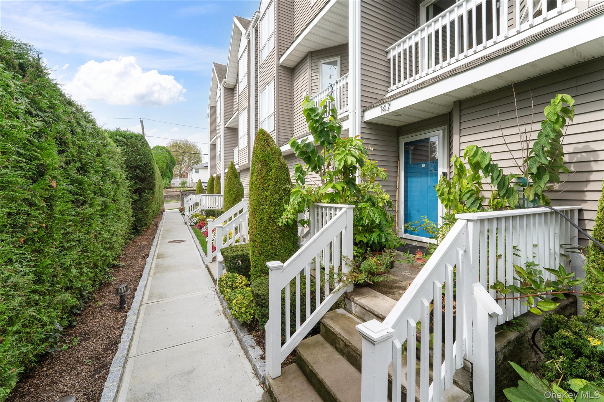 a view of a house with entrance and stairs