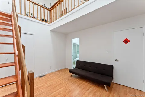 a view of livingroom with furniture and stairs