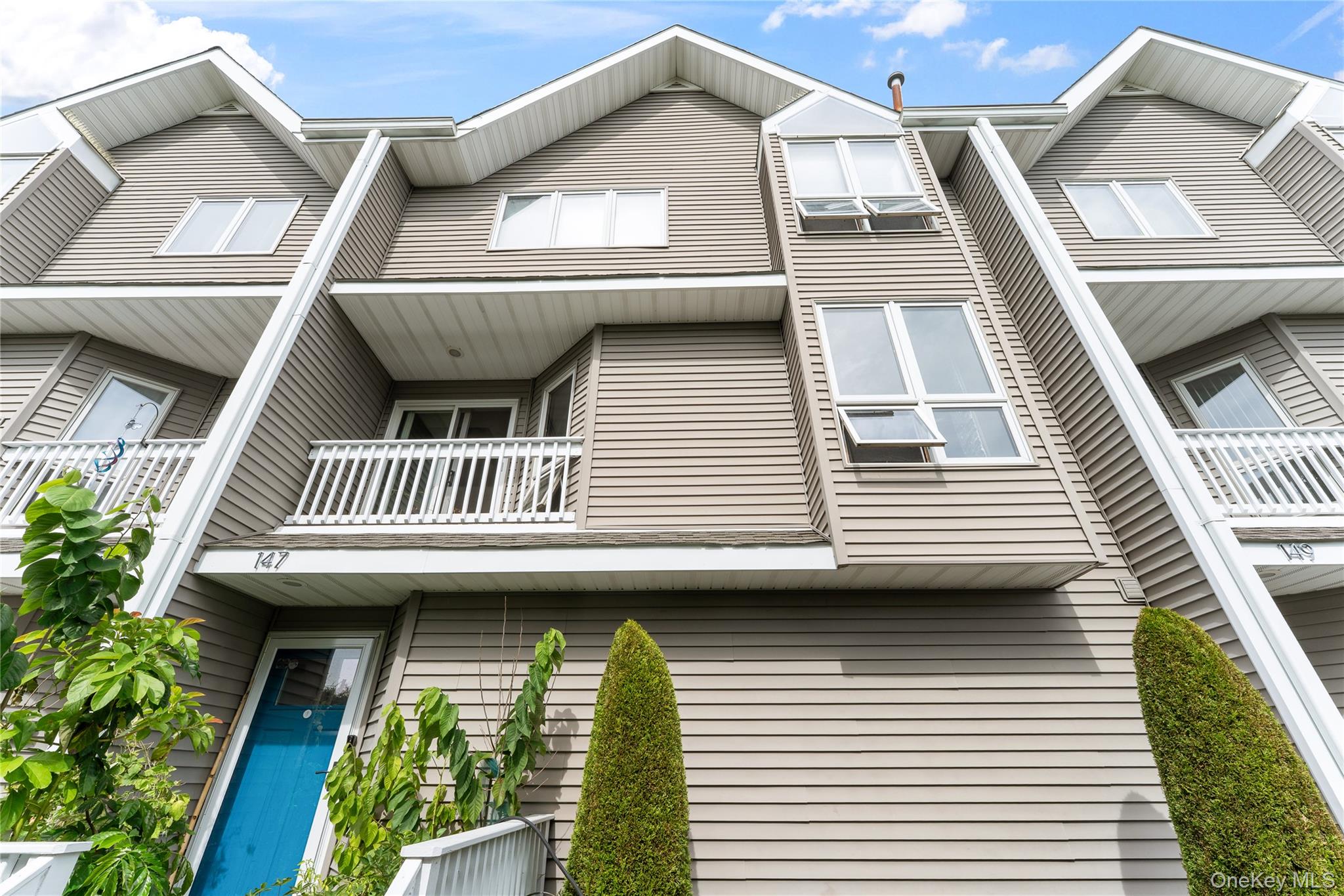 147 I U Willets Road Albertson, NY 11507 - Photo 2 of 14 a view of a balcony with a window