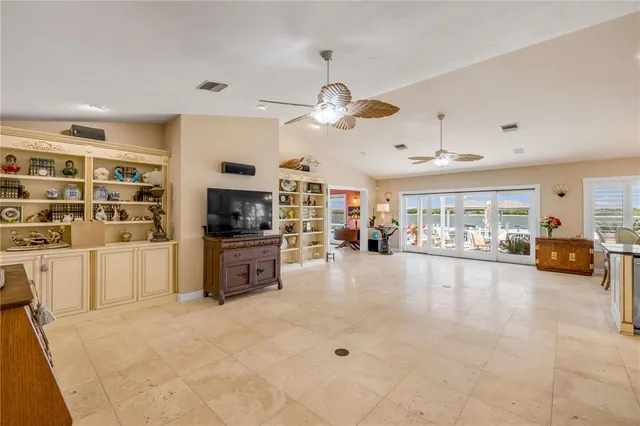 a kitchen with sink cabinets and stainless steel appliances