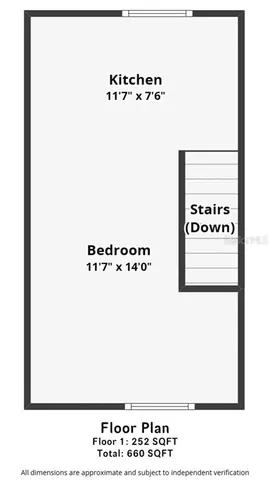 a living room with furniture a fireplace and a chandelier