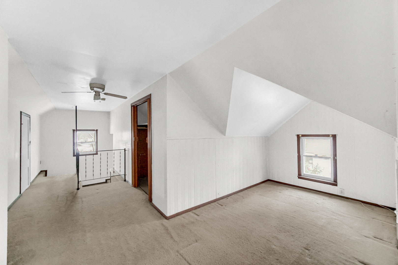 1009 Augusta Avenue Elgin, IL 60120 - Photo 16 of 24 a view of empty room with a ceiling fan