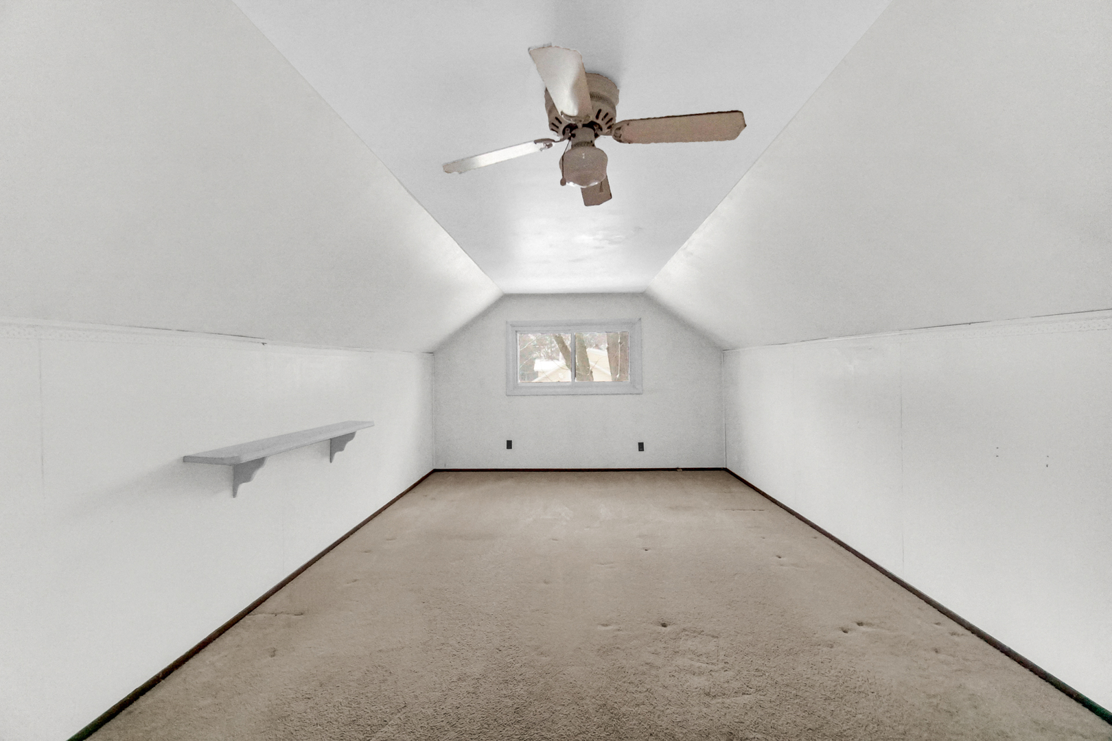 1009 Augusta Avenue Elgin, IL 60120 - Photo 17 of 24 an empty room with a ceiling fan and window