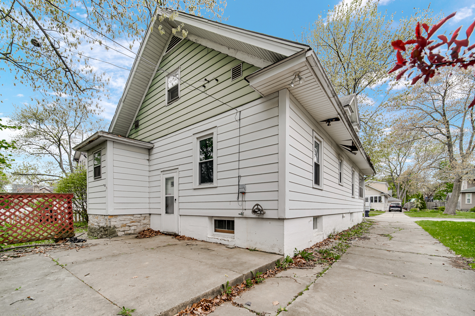 1009 Augusta Avenue Elgin, IL 60120 - Photo 21 of 24 a view of a house with a yard