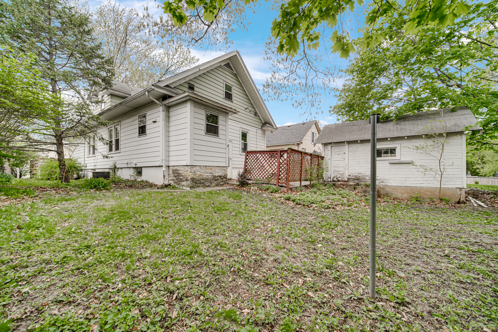 1009 Augusta Avenue Elgin, IL 60120 - Photo 23 of 24 a view of a house with a yard