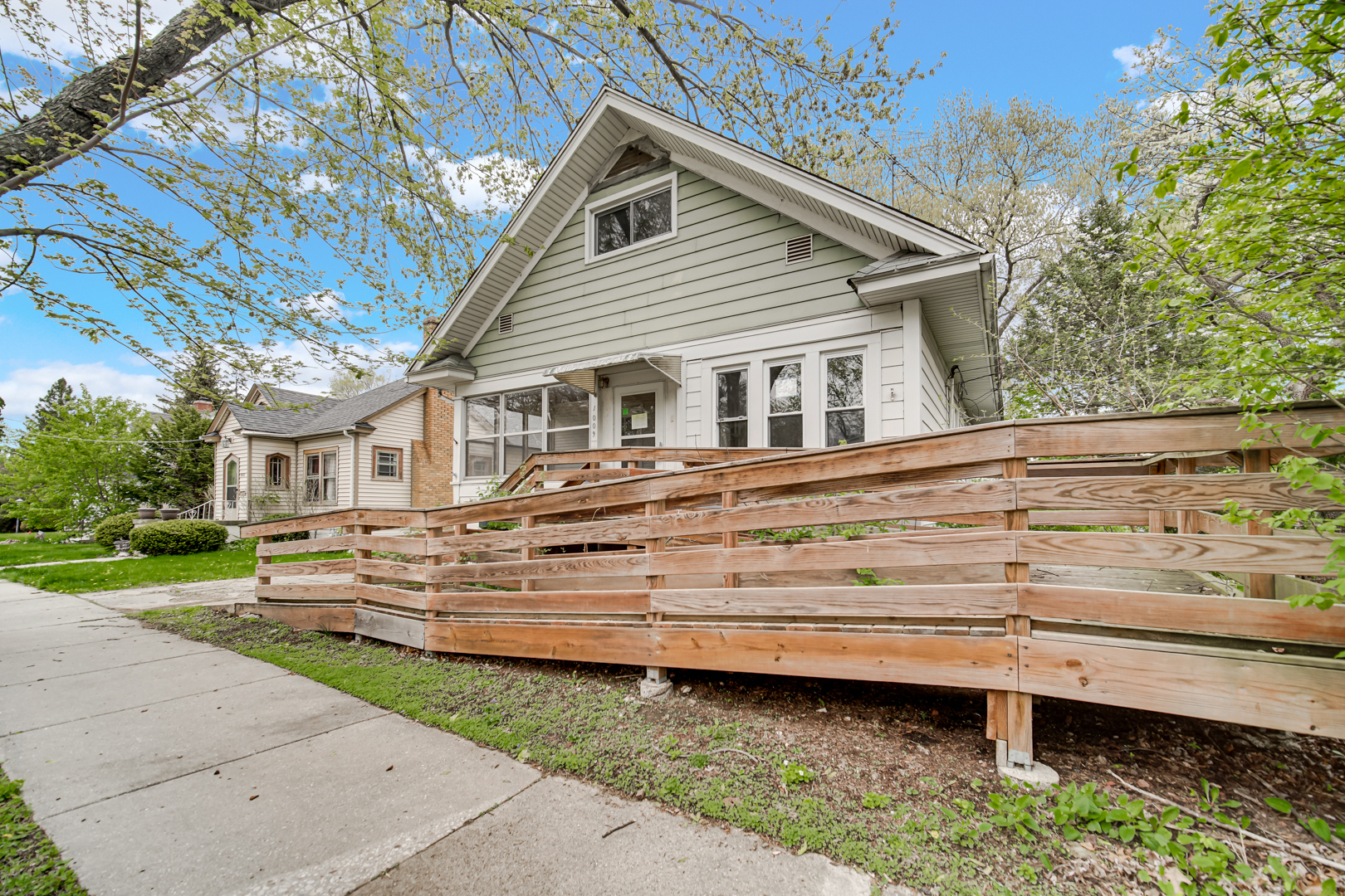 1009 Augusta Avenue Elgin, IL 60120 - Photo 3 of 24 a view of a house with a yard