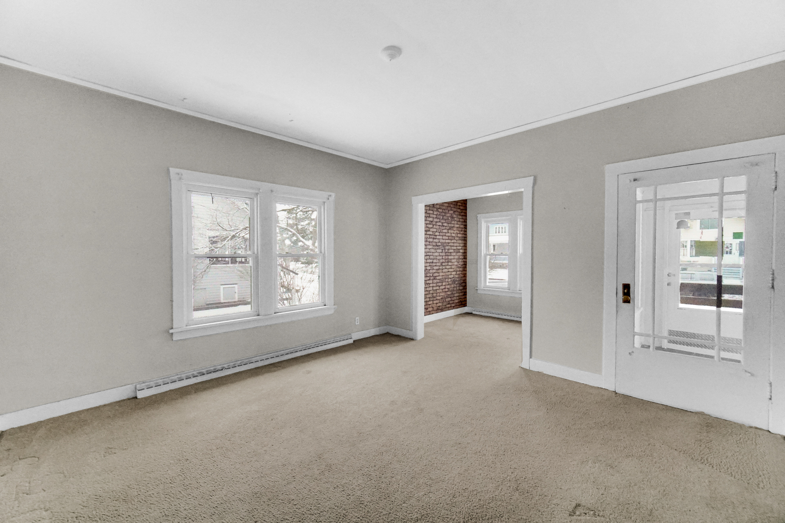 1009 Augusta Avenue Elgin, IL 60120 - Photo 6 of 24 an empty room with windows and closet