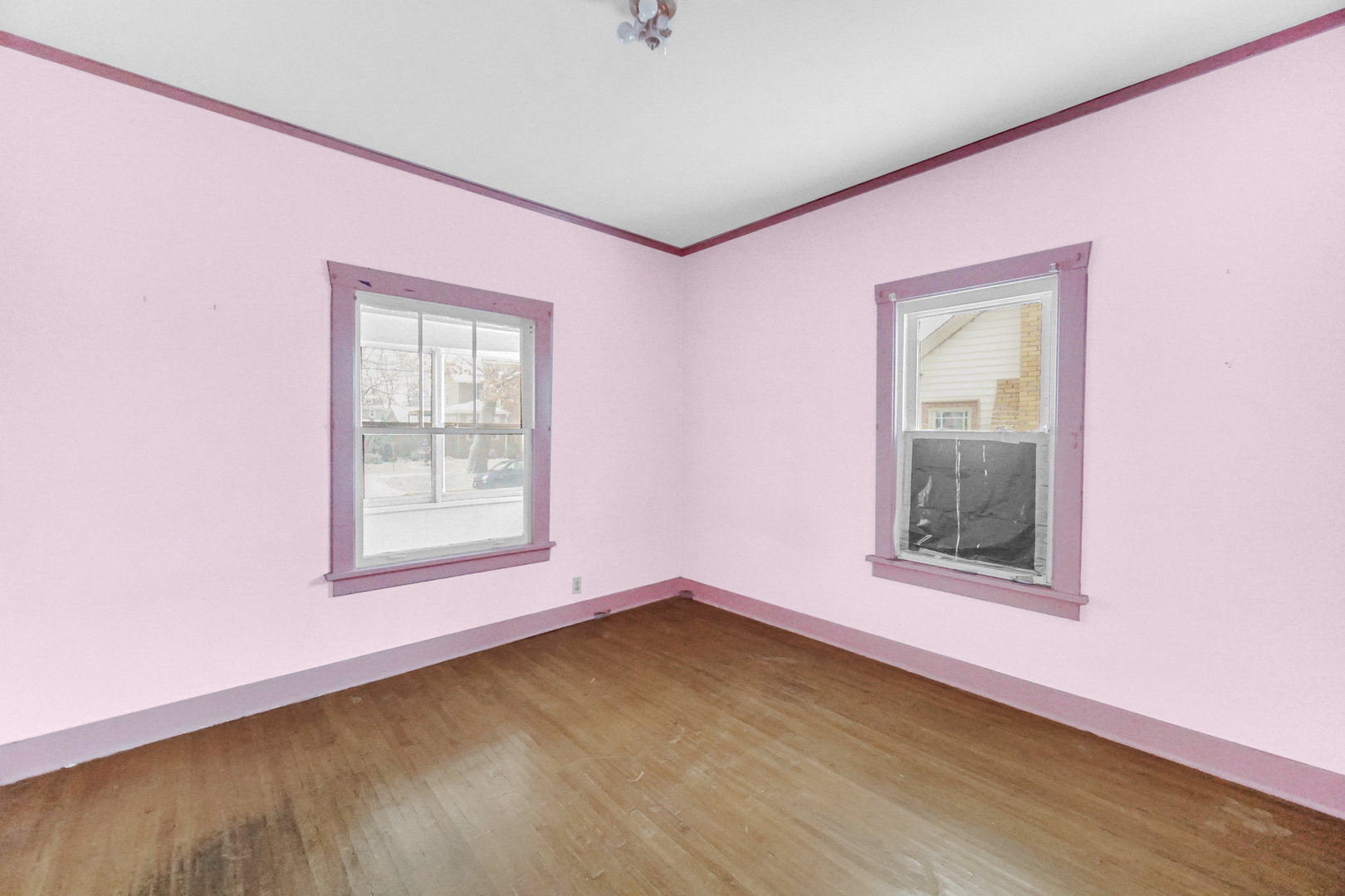 1009 Augusta Avenue Elgin, IL 60120 - Photo 10 of 24 an empty room with a window