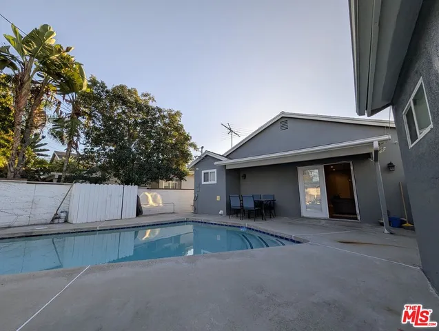 a view of a house with a street