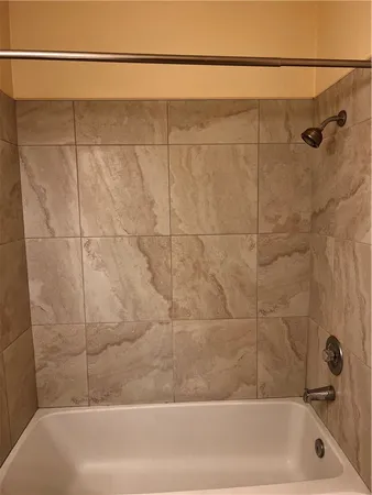 a bathroom with a bathtub