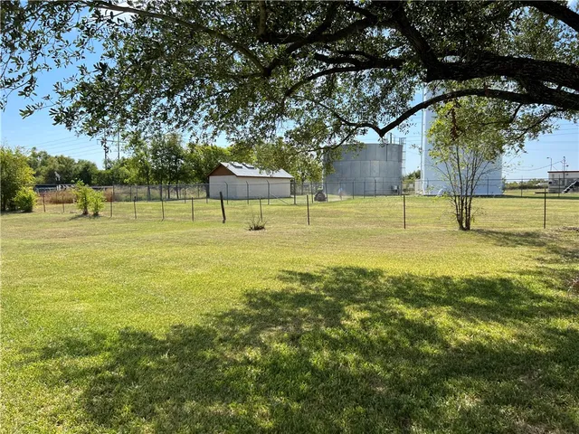 a view of an house with a park