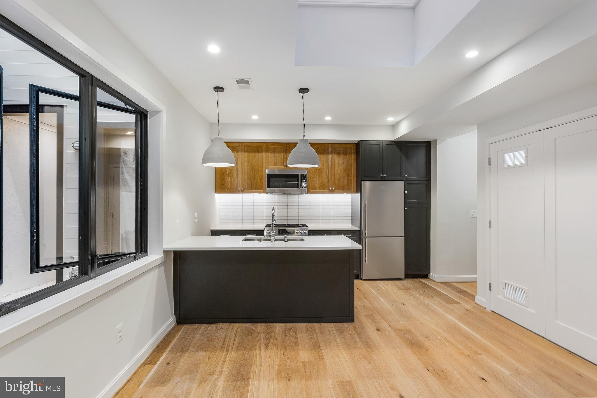 2248 Ontario Road Northwest, Unit 2 Washington, DC 20009 - Photo 13 of 30 LED Recessed lighting and Oak Flooring