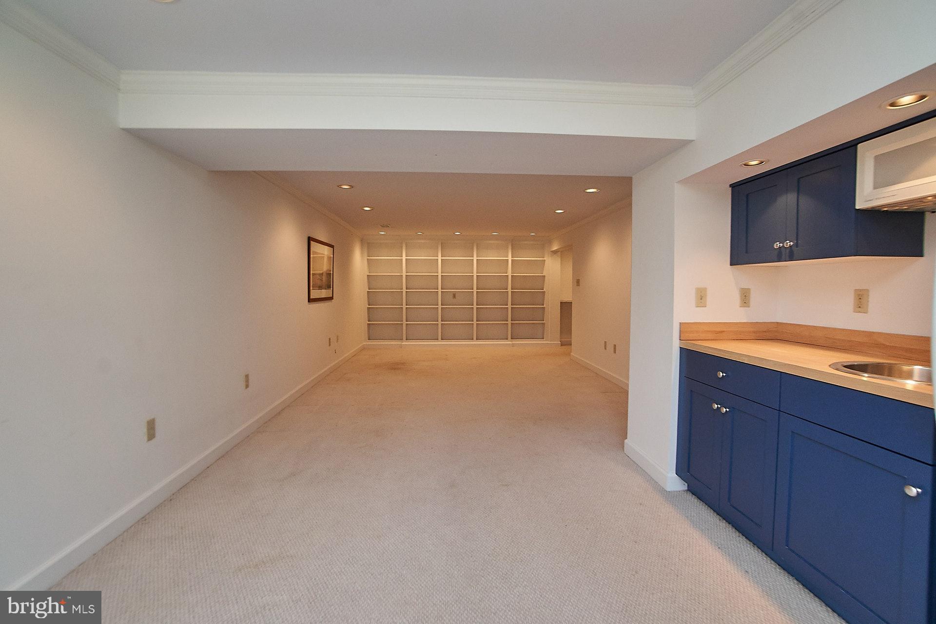 2072 Bingham Court Reston, VA 20191 - Photo 24 of 35 Lower level family room. Built in shelves.