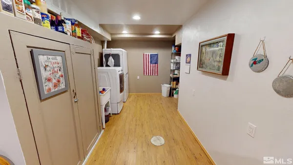 a very nice looking room with wooden floor