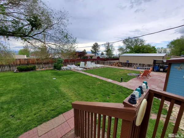 a view of a porch with a yard
