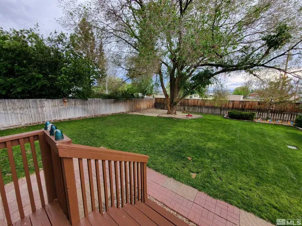 a view of deck with a backyard