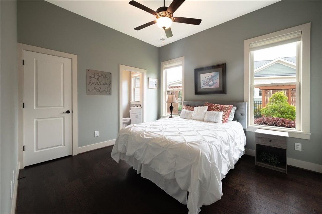 217 Pershing Avenue Clemson, SC 29631 - Photo 17 of 37 Hardwood floors and a ceiling fan adorn this well-appointed bedroom.