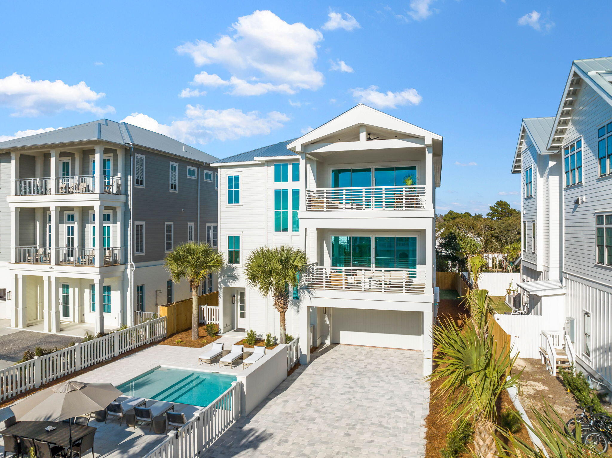 8069 East County Highway 30A Inlet Beach, FL 32461 - Photo 101 of 119 a front view of a house with a yard
