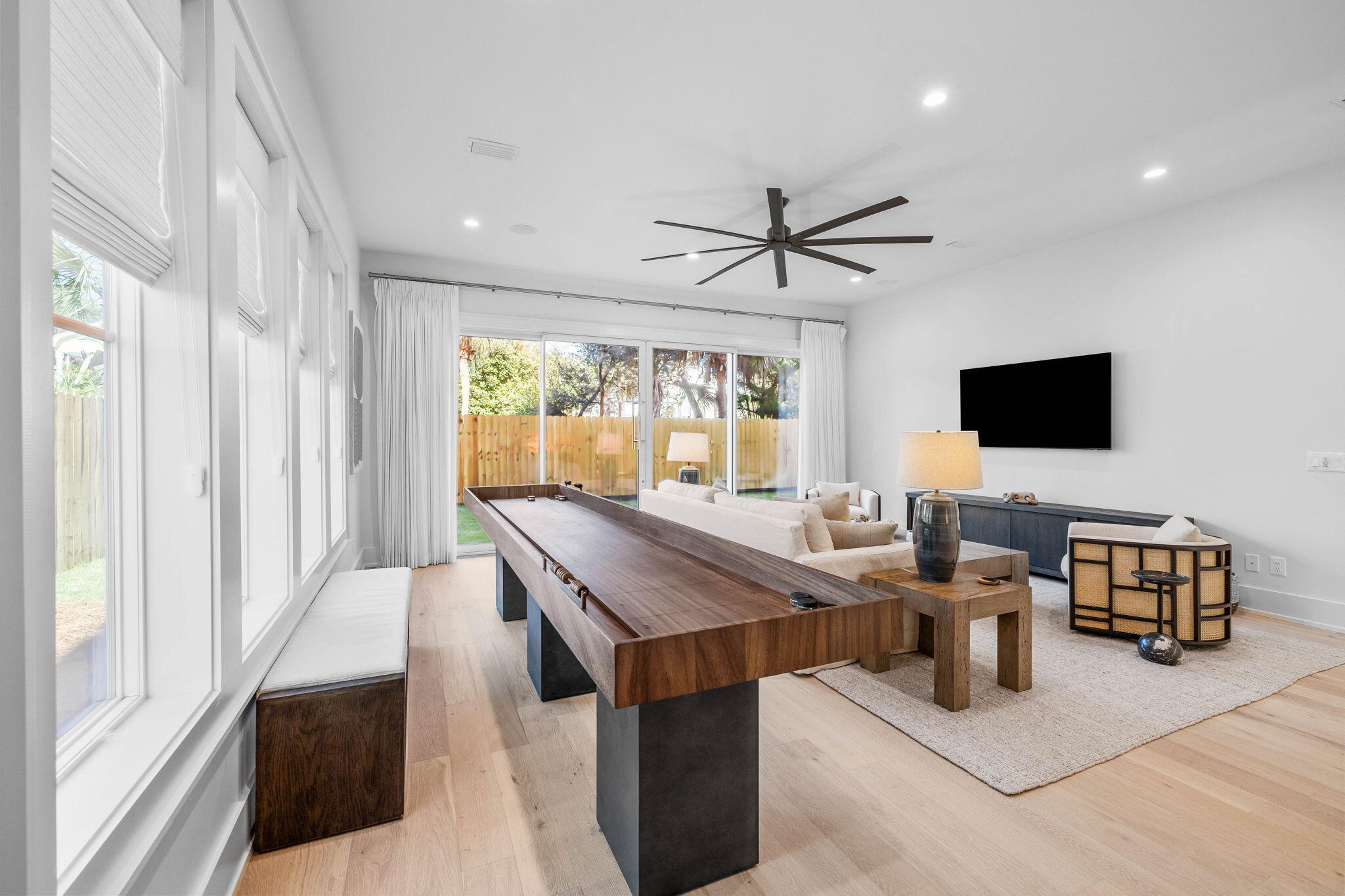 8069 East County Highway 30A Inlet Beach, FL 32461 - Photo 22 of 119 a living room with furniture and a flat screen tv
