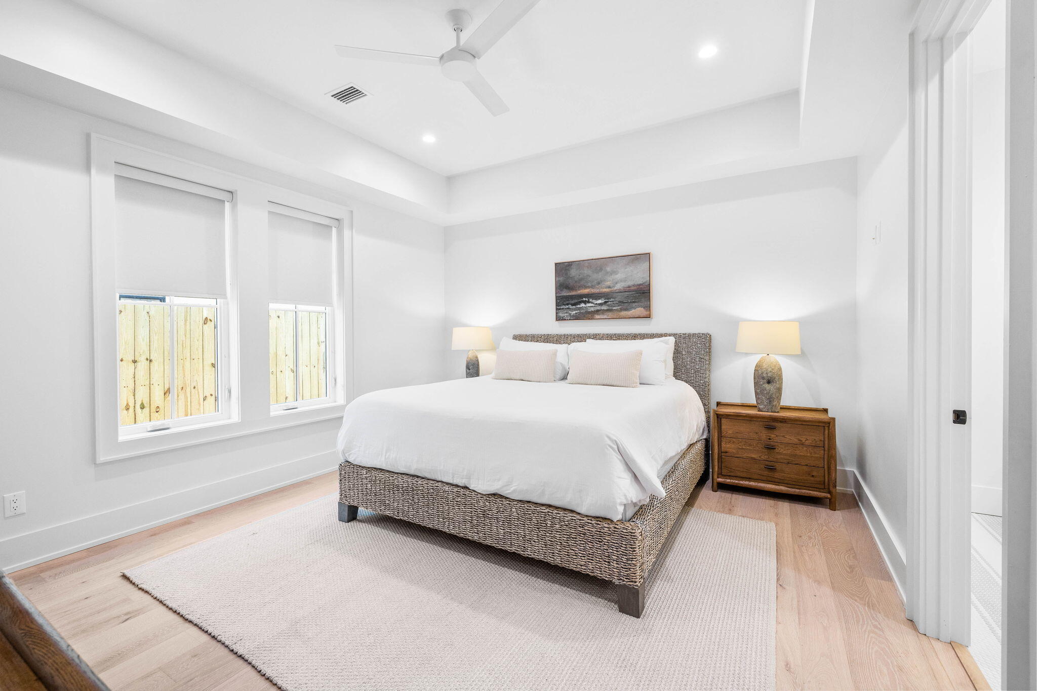 8069 East County Highway 30A Inlet Beach, FL 32461 - Photo 28 of 119 a bedroom with a bed and a night stand