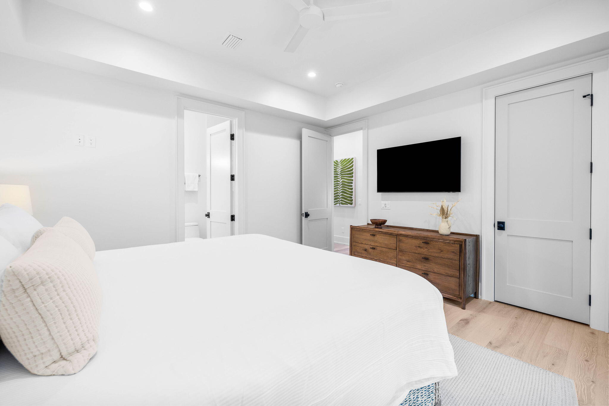 8069 East County Highway 30A Inlet Beach, FL 32461 - Photo 29 of 119 a bedroom with a bed and a flat screen tv