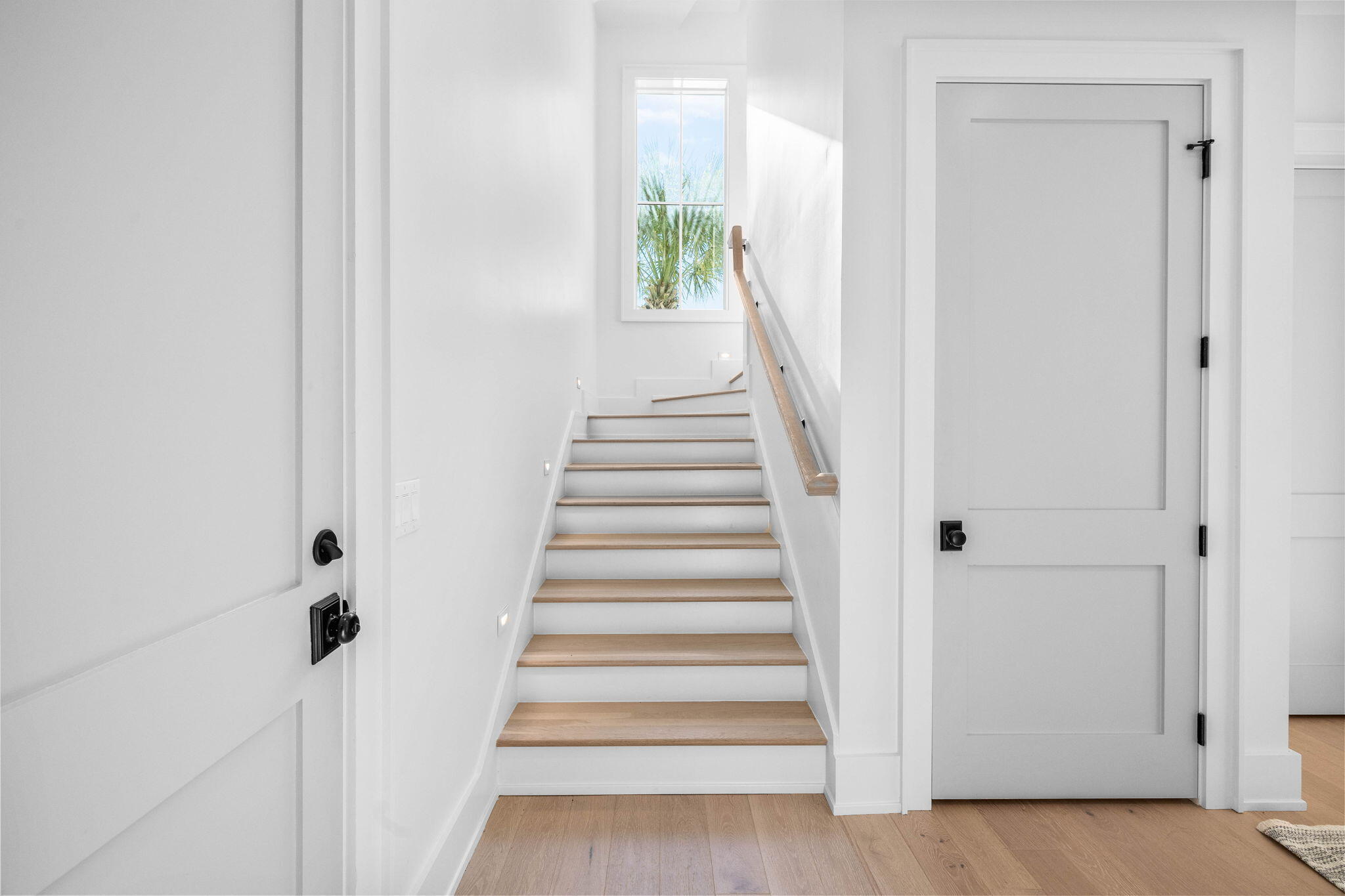 8069 East County Highway 30A Inlet Beach, FL 32461 - Photo 35 of 119 a view of a hallway with wooden floor and entryway