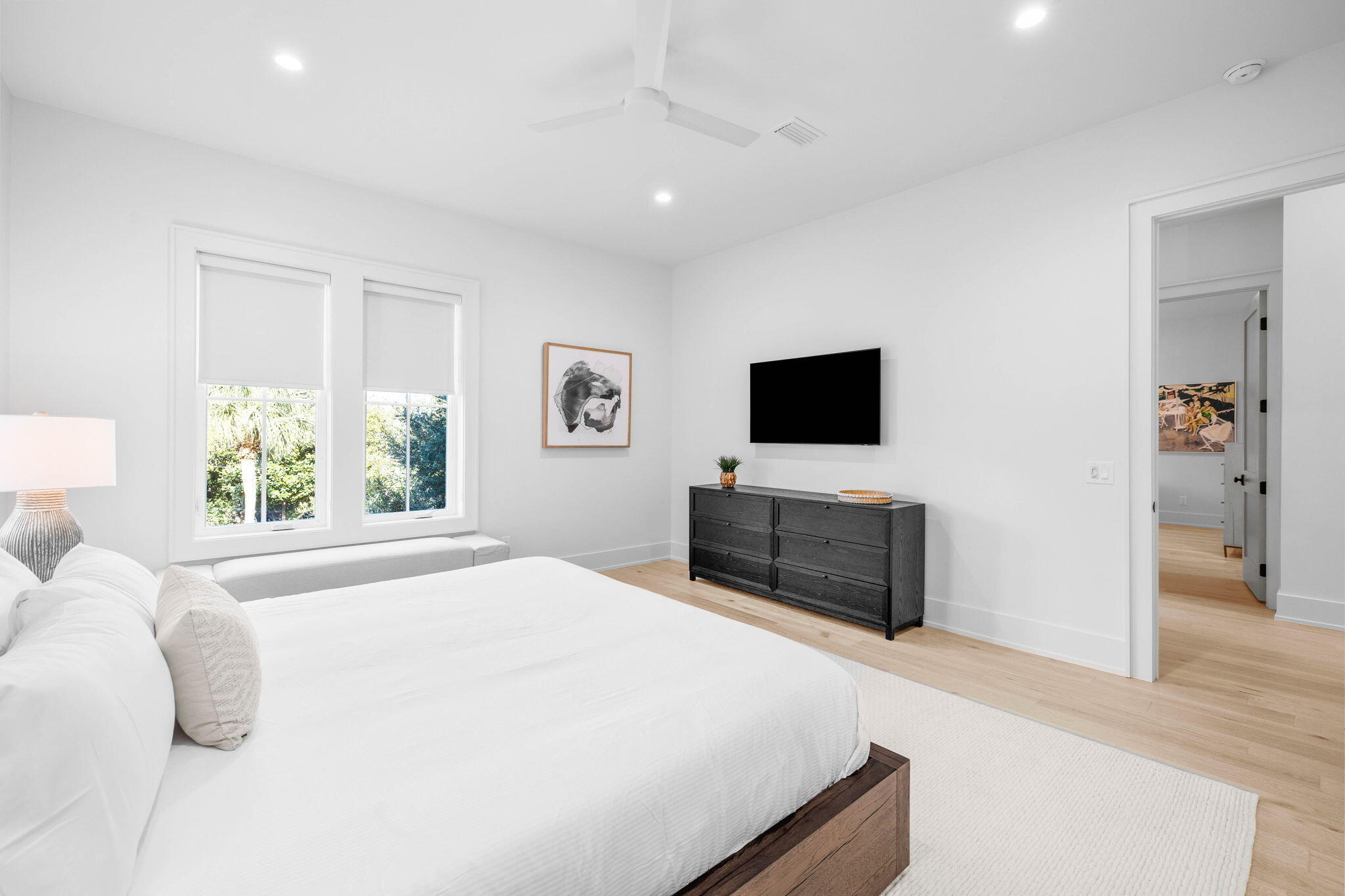 8069 East County Highway 30A Inlet Beach, FL 32461 - Photo 60 of 119 a bedroom with a bed and a flat screen tv