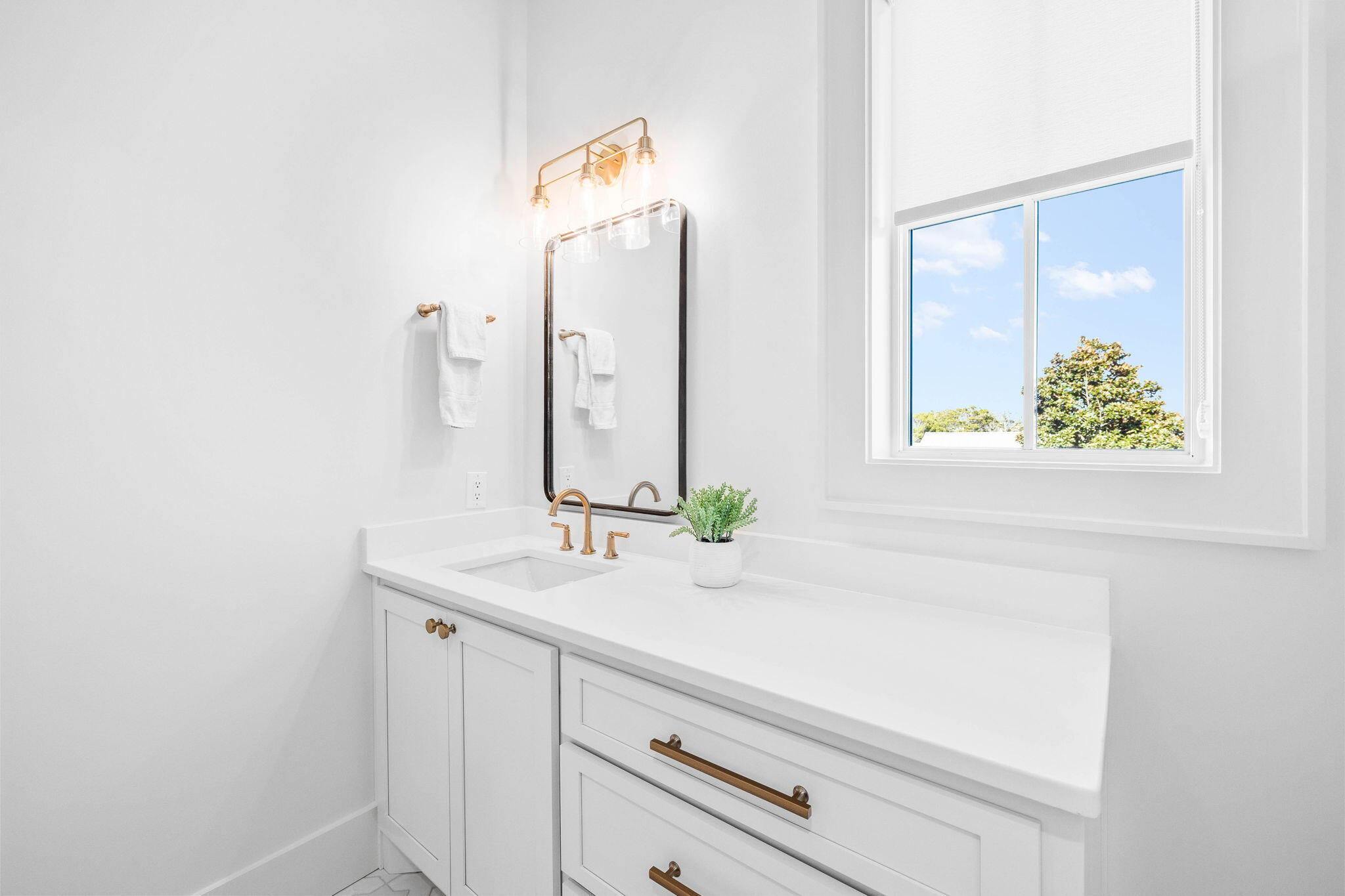 8069 East County Highway 30A Inlet Beach, FL 32461 - Photo 74 of 119 a bathroom with a sink and a mirror