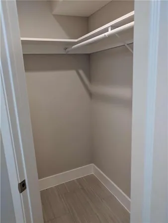 a view of an empty walk in closet