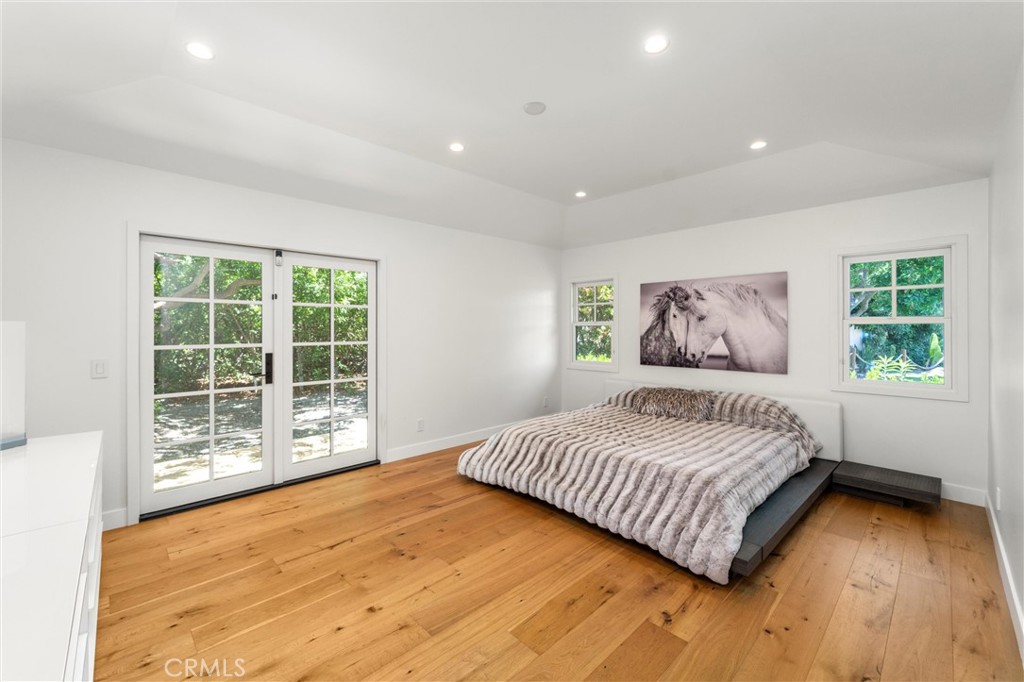 7337 La Soldadera Rancho Santa Fe, CA 92067 - Photo 30 of 60 a bedroom with a large bed and a window