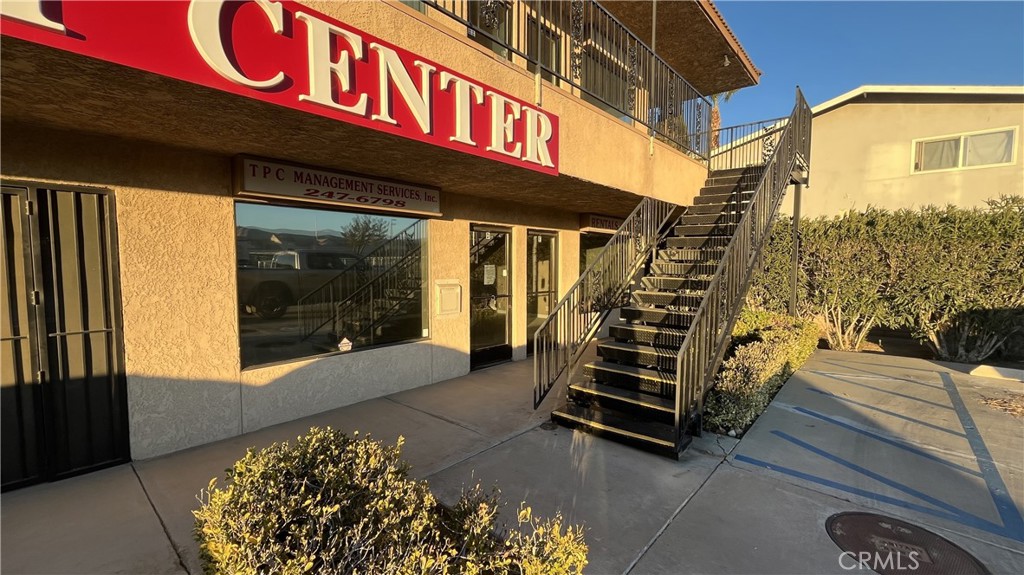 20786 Bear Valley Road, Unit D & E Apple Valley, CA 92308 - Photo 2 of 9 a view of a entryway door of the house