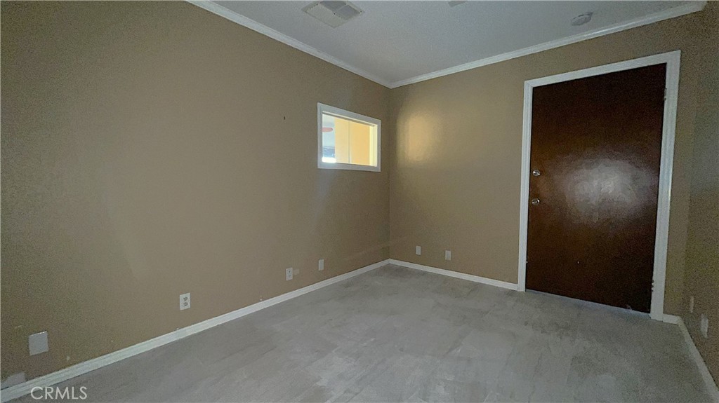 20786 Bear Valley Road, Unit D & E Apple Valley, CA 92308 - Photo 8 of 9 an empty room with windows