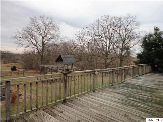 167 Jacks Shop Road Rochelle, VA 22738 - Photo 5 of 20 a view of a balcony with wooden floor and fence