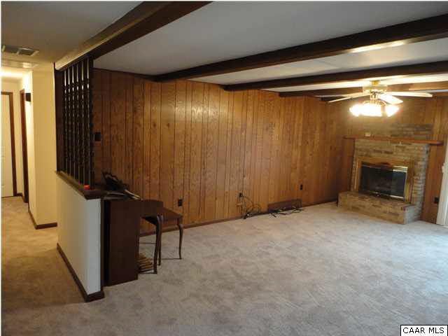 167 Jacks Shop Road Rochelle, VA 22738 - Photo 7 of 20 a view of an empty room with a fireplace