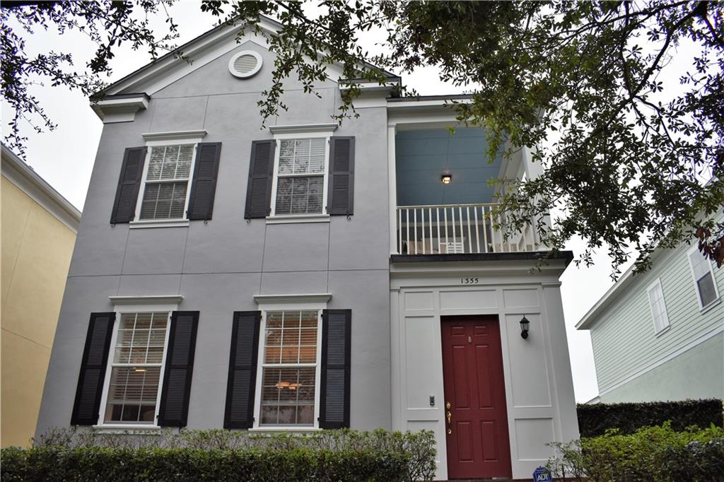 1355 Bennett Road Orlando, FL 32814 - Photo 1 of 1 a front view of a house with a garden