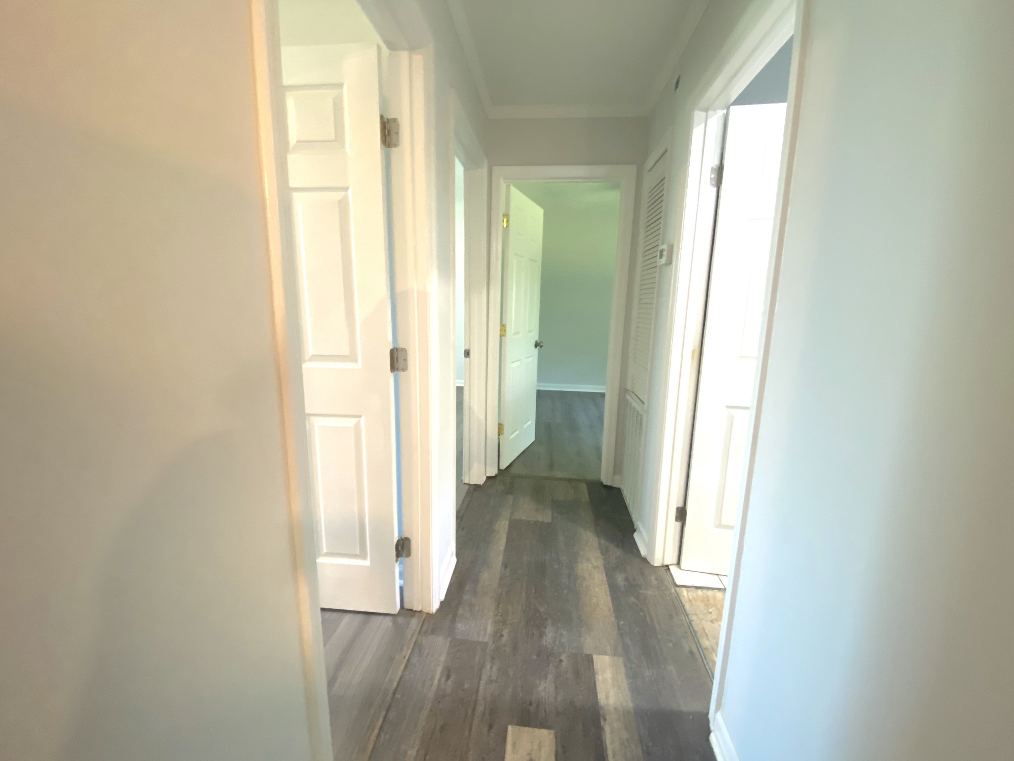 508 Roundup Road Smyrna, TN 37167 - Photo 14 of 33 a view of a hallway with wooden floor and a glass door