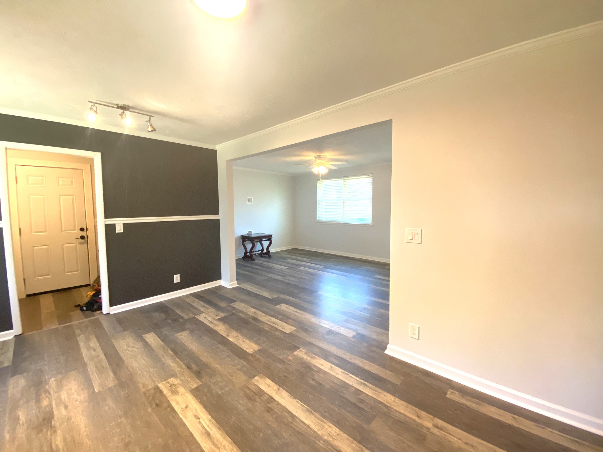 508 Roundup Road Smyrna, TN 37167 - Photo 16 of 33 a view of a livingroom with wooden floor and a ceiling fan