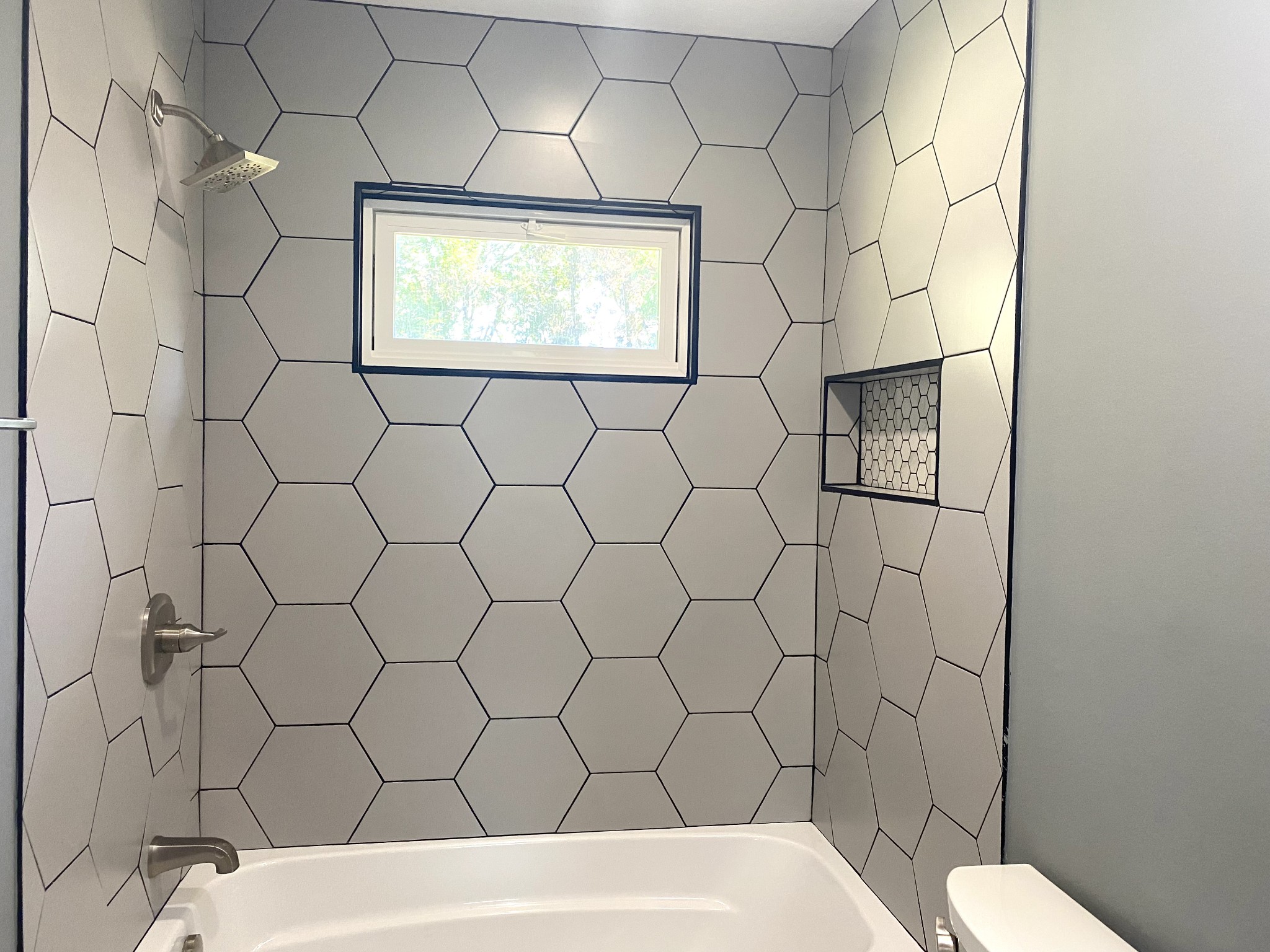 508 Roundup Road Smyrna, TN 37167 - Photo 19 of 33 a bathroom with a bathtub and a shower