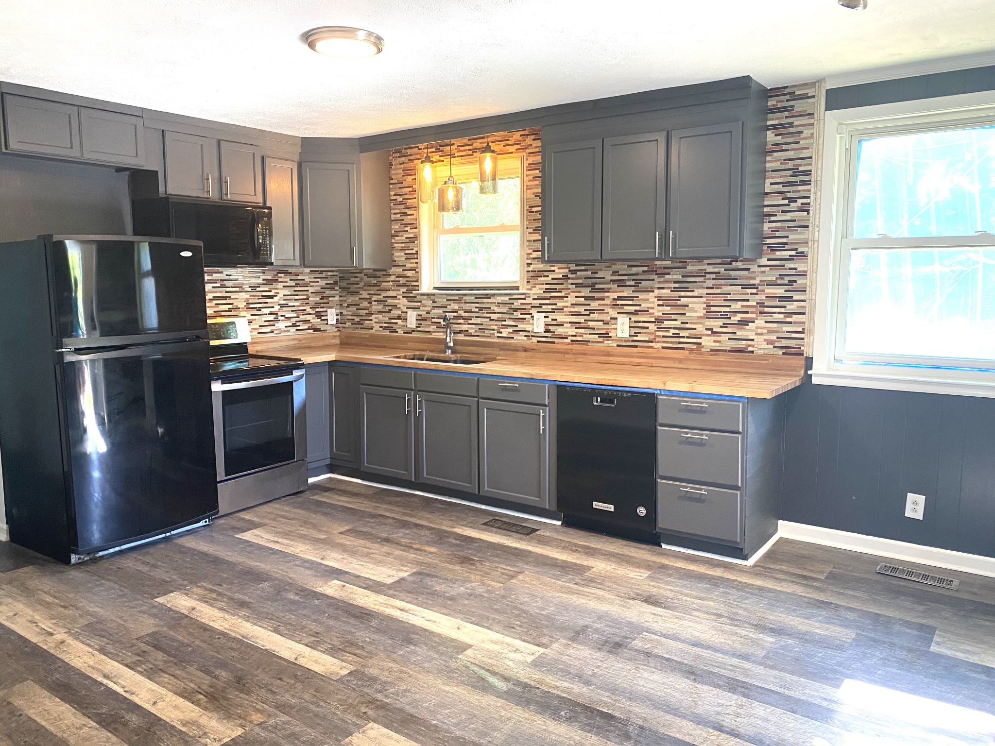508 Roundup Road Smyrna, TN 37167 - Photo 6 of 33 a kitchen with stainless steel appliances granite countertop a sink stove and refrigerator