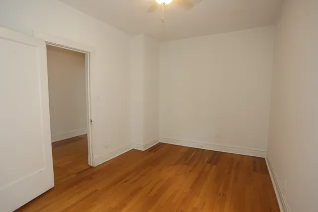 a view of small space with wooden floor